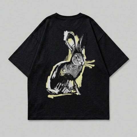 Black t-shirt with a stylized rabbit graphic in yellow and black.
