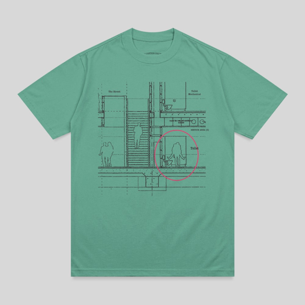 Teal t-shirt with schematic diagram of building interior, including "The Street" and toilet areas.