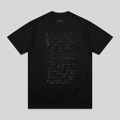 Black t-shirt with grey handwritten text and "COTTON COU" logo.