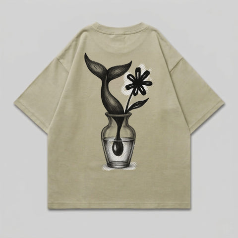 T-shirt with whale tail and abstract flower in glass vase illustration.