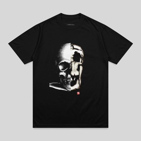 Black t-shirt with split graphic of a skull and a human face.