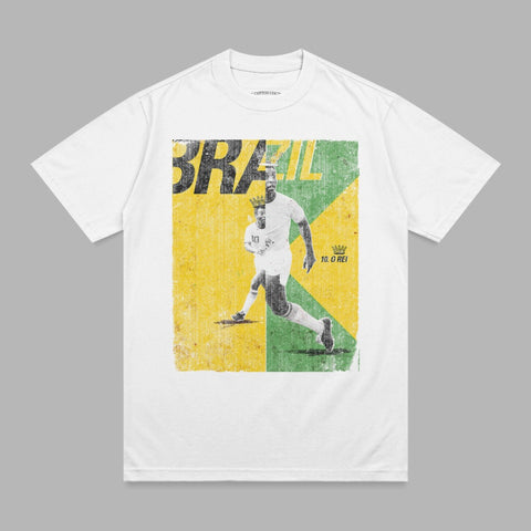 White t-shirt with vintage graphic of Brazilian soccer player Pelé running, "BRAZIL 10. O REI" text.