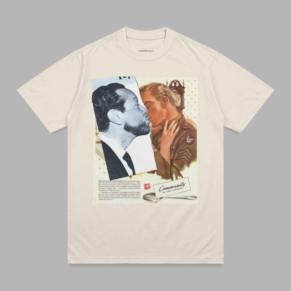 Cream t-shirt featuring vintage advertisement of two men kissing, "Community" text.