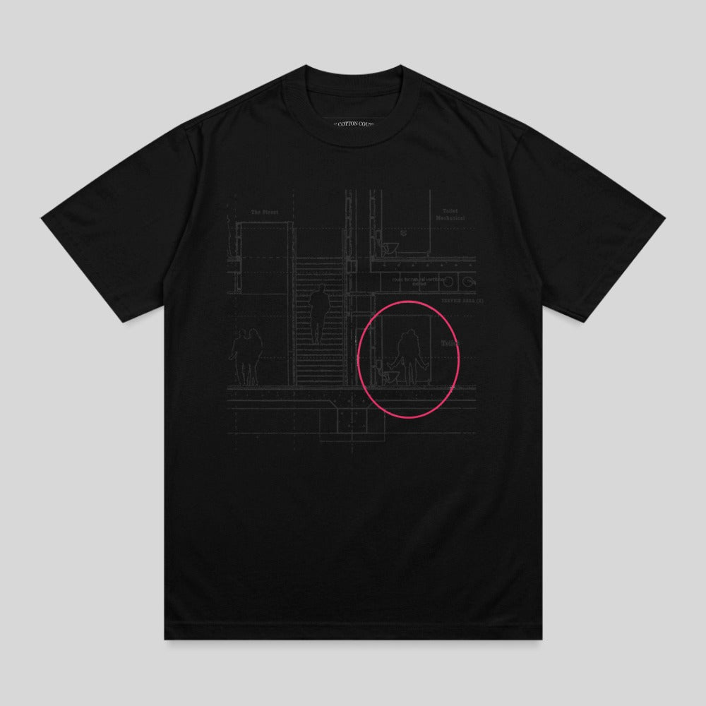 Black t-shirt with a diagram of a building interior, featuring a pink circle around a doorway.