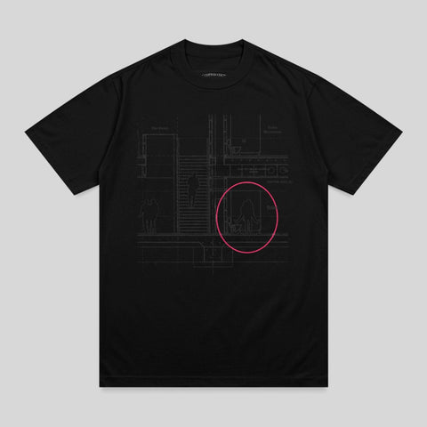 Black t-shirt with a diagram of a building interior, featuring a pink circle around a doorway.