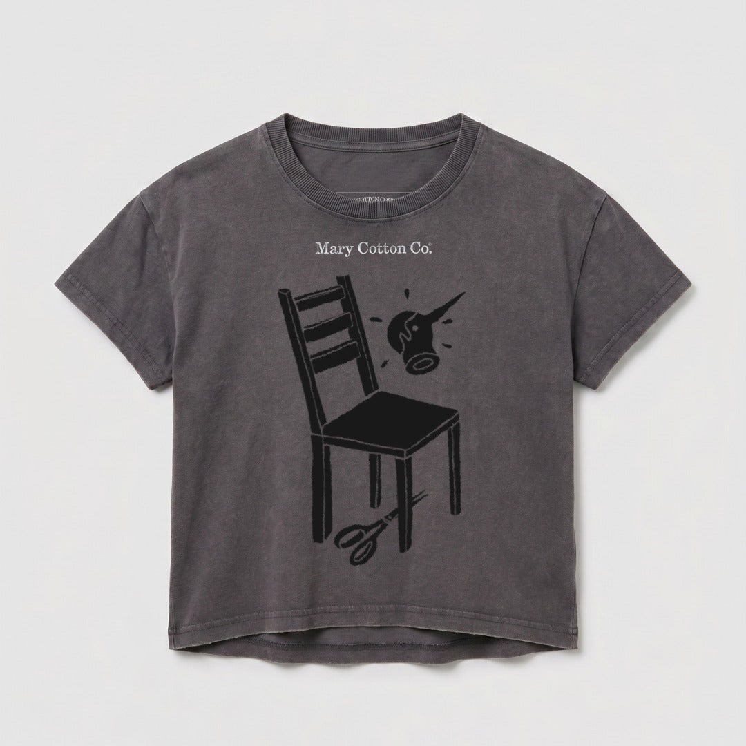 Dark grey t-shirt with a chair, scissors, and watering can graphic.