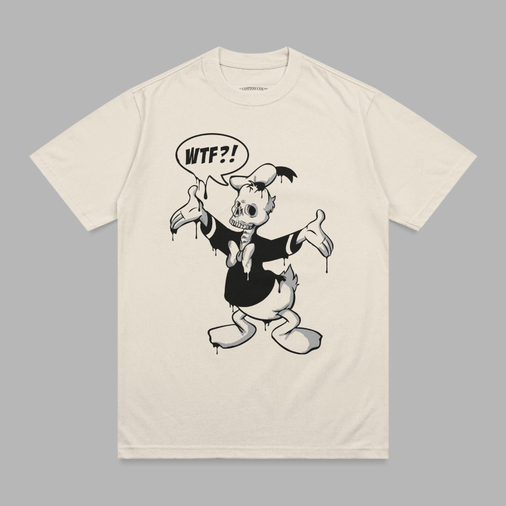 Cream t-shirt with a melting skeleton Donald Duck cartoon and speech bubble saying "WTF?!".