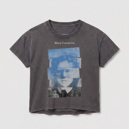 Gray t-shirt with Warhol-esque portrait in blue and black stripes.