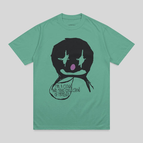 T-shirt with a black clown face and purple accents, saying "I am a clown and make collection of moments."
