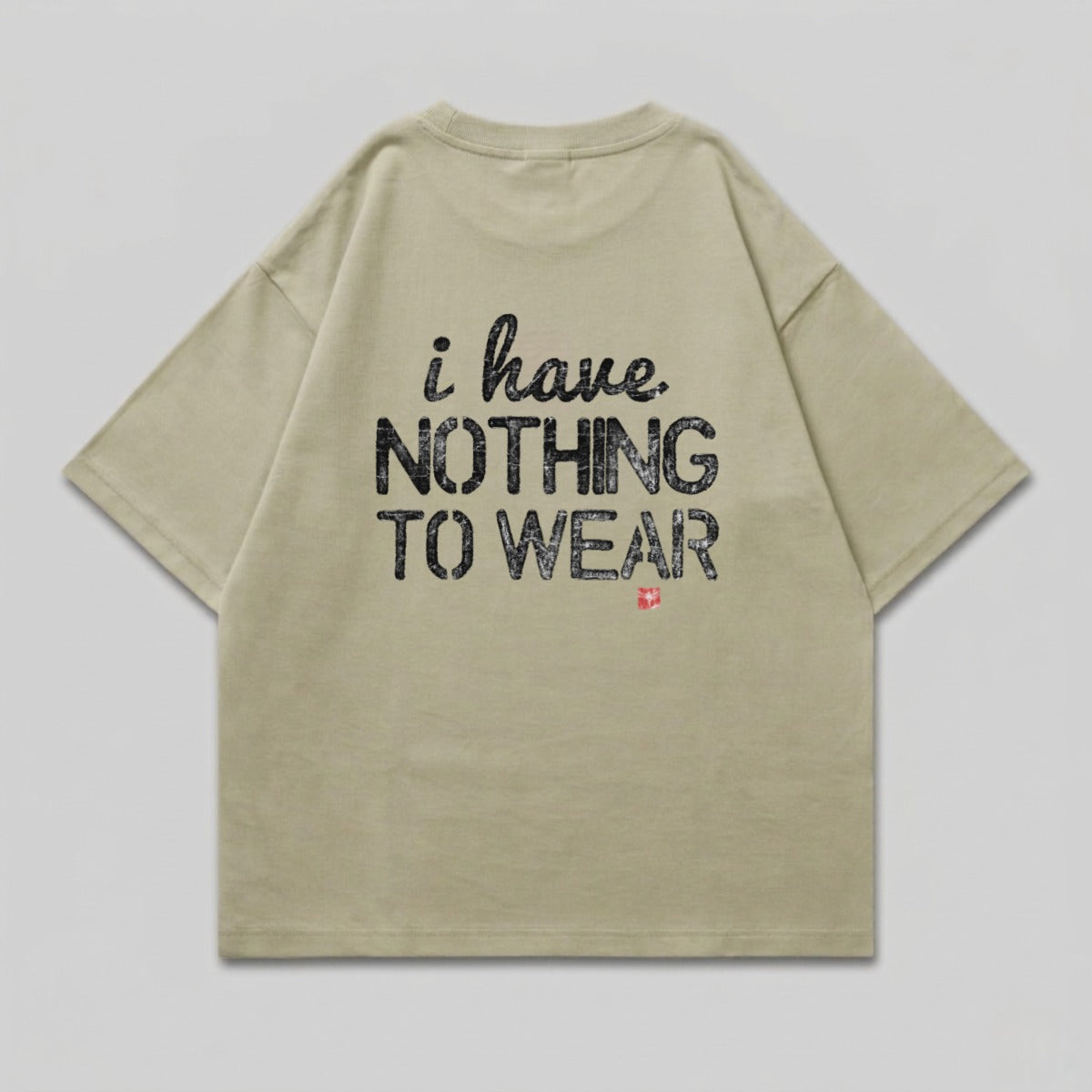 Tan t-shirt with "i have NOTHING TO WEAR" and Swiss flag graphic.
