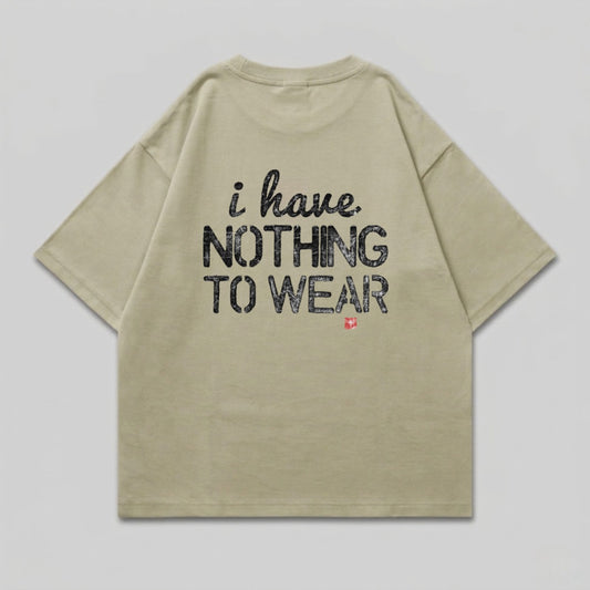Tan t-shirt with "i have NOTHING TO WEAR" and Swiss flag graphic.