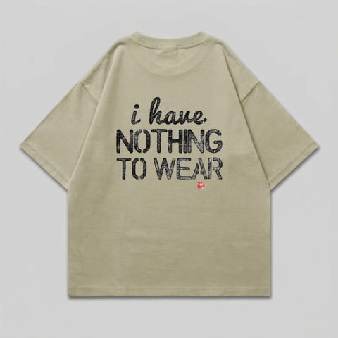 Tan t-shirt with "i have NOTHING TO WEAR" and Swiss flag graphic.
