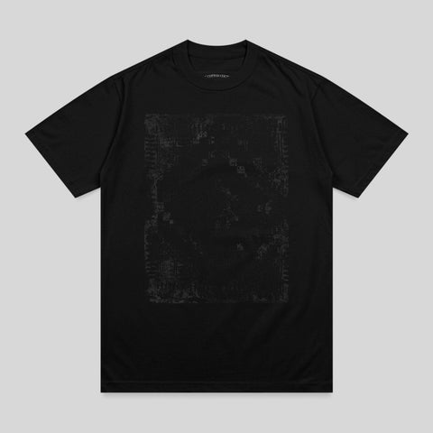 Black t-shirt with faded graphic print and small text at neckline.