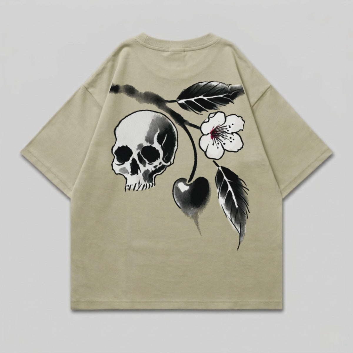 Beige t-shirt with a black ink skull and cherry blossom design.