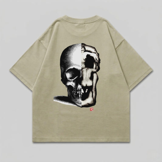 T-shirt with a split skull graphic, half skeletal, half human form.