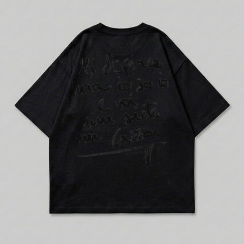 Black t-shirt with handwritten text in Italian on the back.