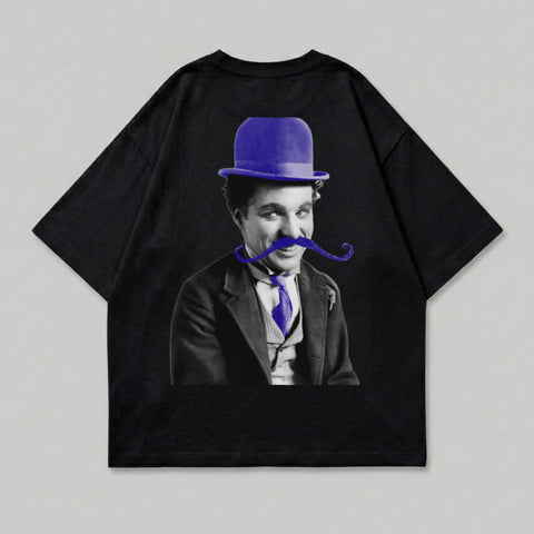 Charlie Chaplin wearing a blue bowler hat and mustache, printed on a black t-shirt.