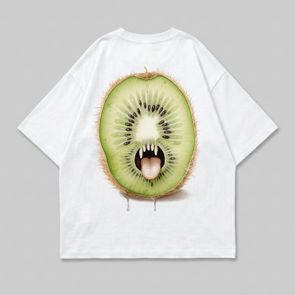 White t-shirt with a sliced kiwi fruit monster graphic.