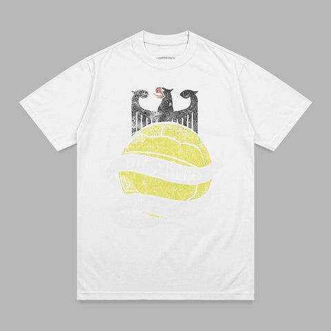White t-shirt with a graphic of a German eagle holding a banner over a yellow soccer ball.