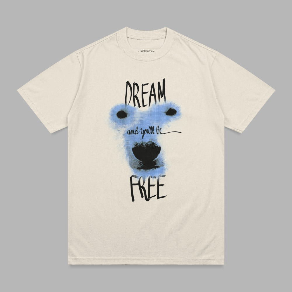 Cream t-shirt with blue polar bear face and text "DREAM and you'll be FREE".