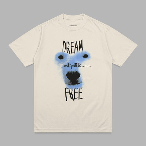 Cream t-shirt with blue polar bear face and text "DREAM and you'll be FREE".