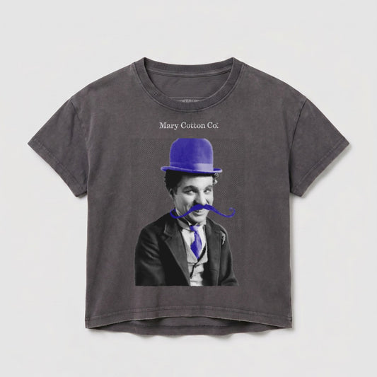 T-shirt with Charlie Chaplin's character wearing a blue hat and blue tie.