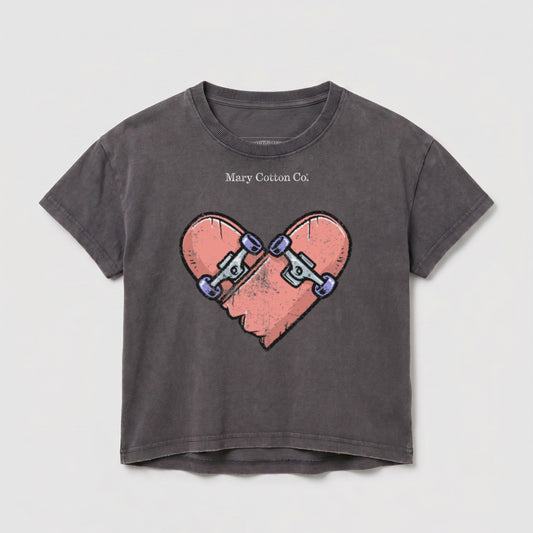 Grey t-shirt with a cracked heart design featuring skateboards.