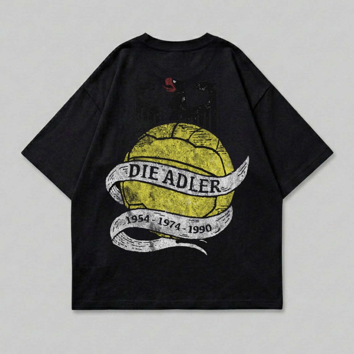 Black t-shirt with yellow volleyball and banner reading "Die Adler 1954-1974-1990".