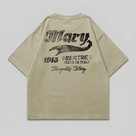 Tan t-shirt with "Mary 1953 INDUSTRIES MADE IN ITALY Fine quality Clothing" on the back.