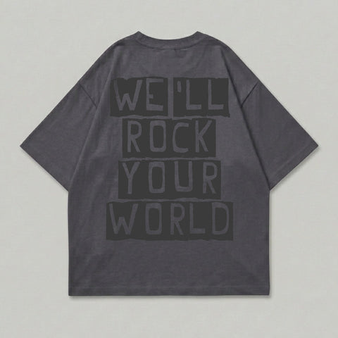 Dark grey t-shirt with "WE'LL ROCK YOUR WORLD" text in black.