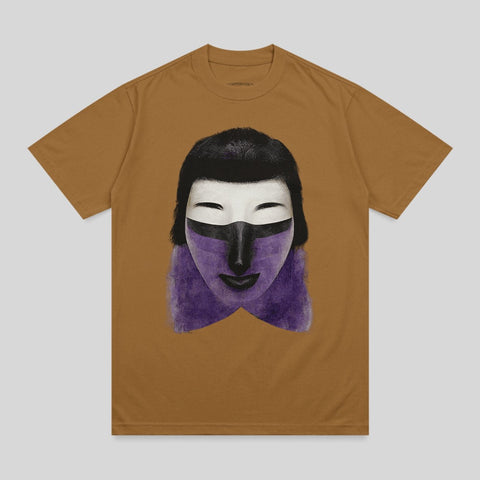 Brown t-shirt with a graphic of a stylized face with black hair and purple lips.