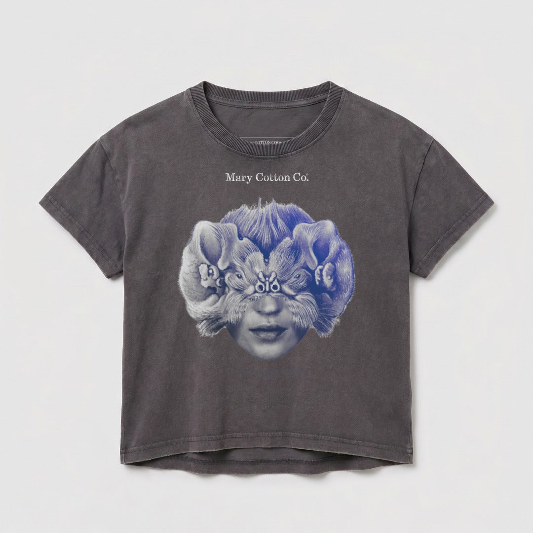 Dark gray t-shirt with a blue and white surreal graphic of a face with fur and eyes.