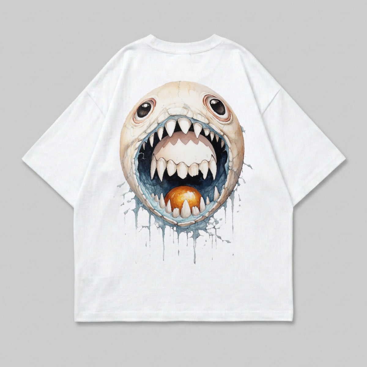 White t-shirt with a cartoonish monster face design, open mouth with sharp teeth.