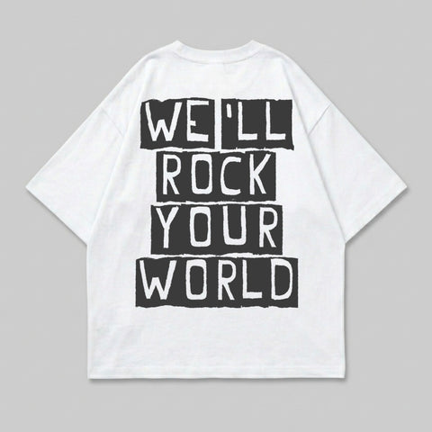 White t-shirt with "WE'LL ROCK YOUR WORLD" text in black block letters.