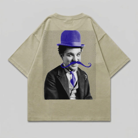 Charlie Chaplin wearing a blue bowler hat and a handlebar mustache.