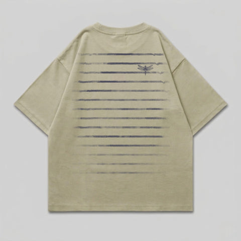 Khaki t-shirt with subtle horizontal stripe pattern and dragonfly graphic.