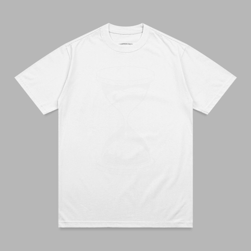 White t-shirt with a faint hourglass graphic and "COTTON CO." logo.