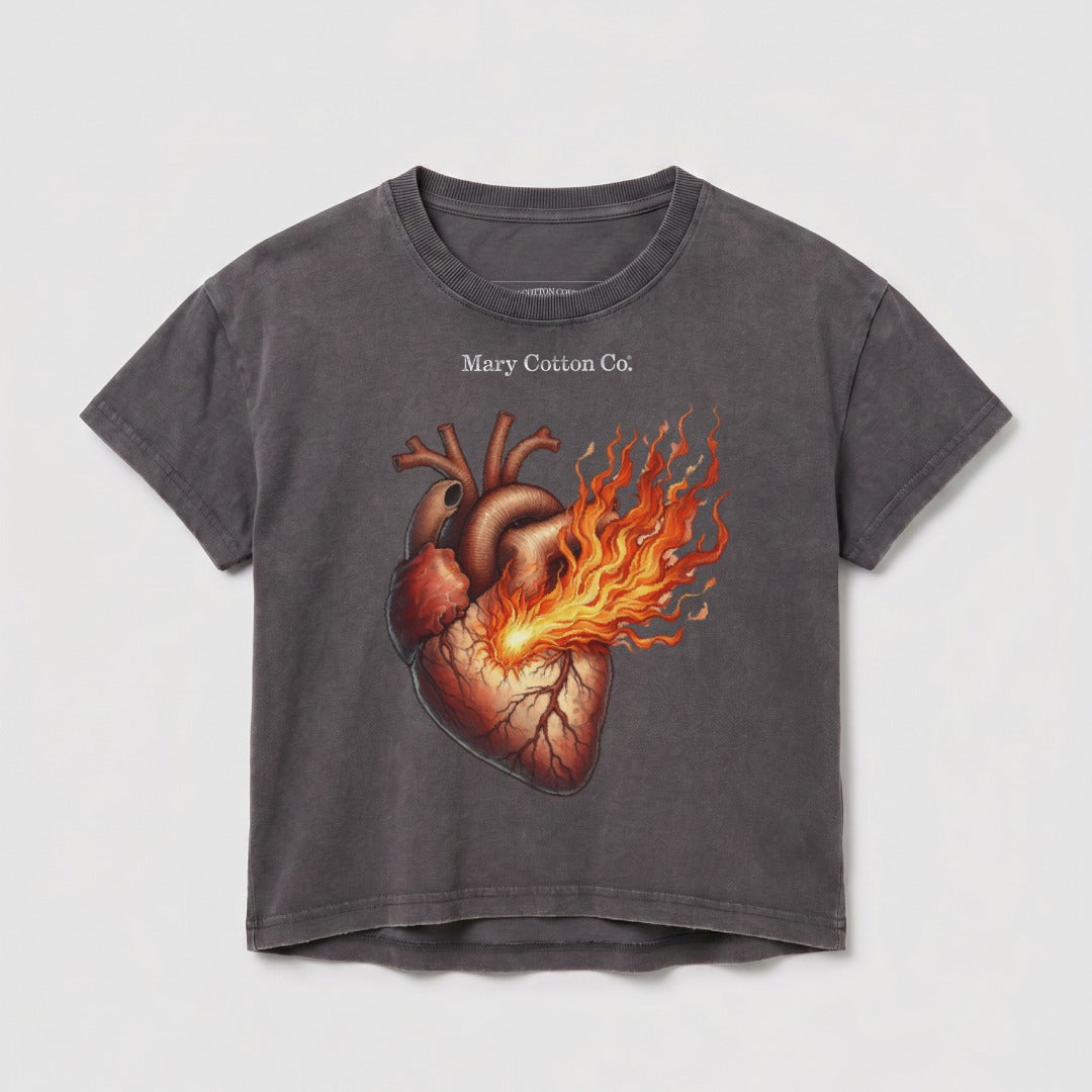 Dark grey t-shirt with a graphic of a burning anatomical heart and "Mary Cotton Co." text.