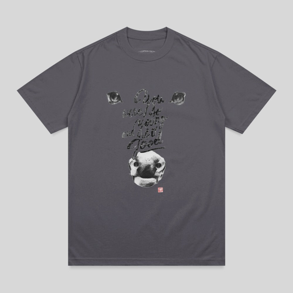 Grey t-shirt with graphic of a cow's face and text.