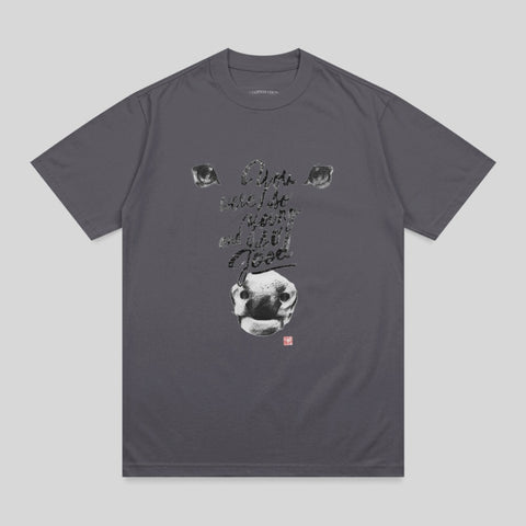 Grey t-shirt with graphic of a cow's face and text.