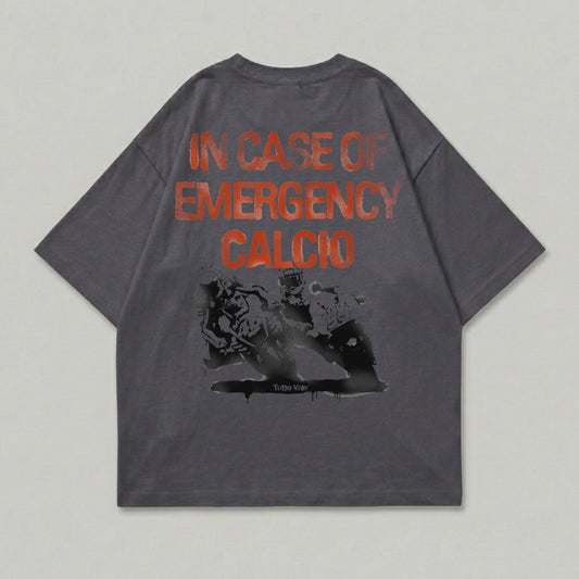 T-shirt with graphic of racing motorcycles and text "IN CASE OF EMERGENCY CALCIO".