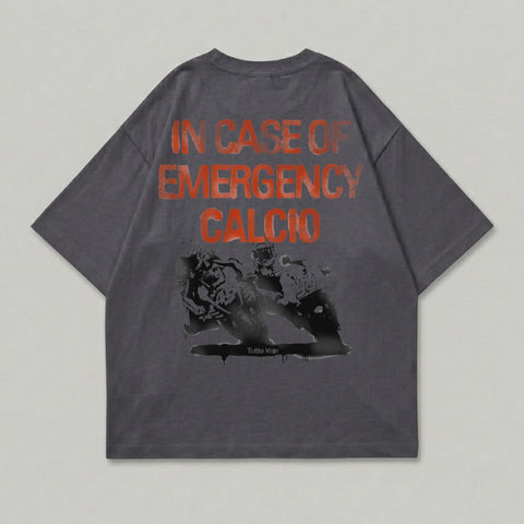T-shirt with graphic of racing motorcycles and text "IN CASE OF EMERGENCY CALCIO".
