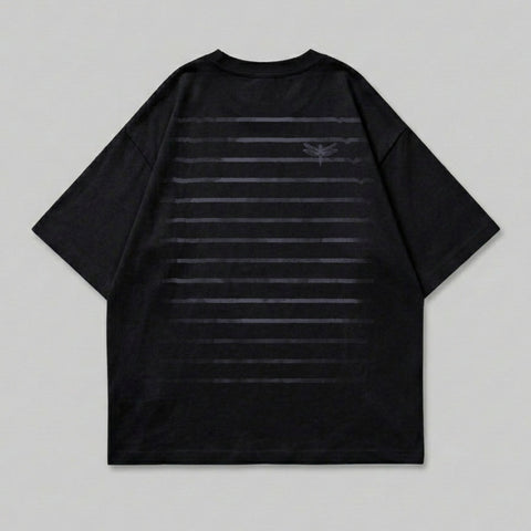 Black t-shirt with subtle horizontal stripe pattern and small dragonfly logo.
