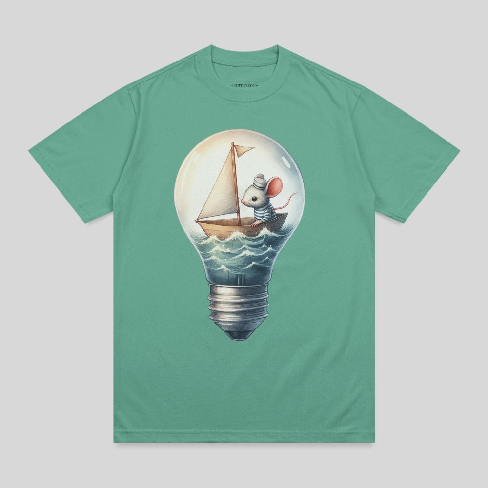 Mouse in sailboat inside a lightbulb on a teal t-shirt.