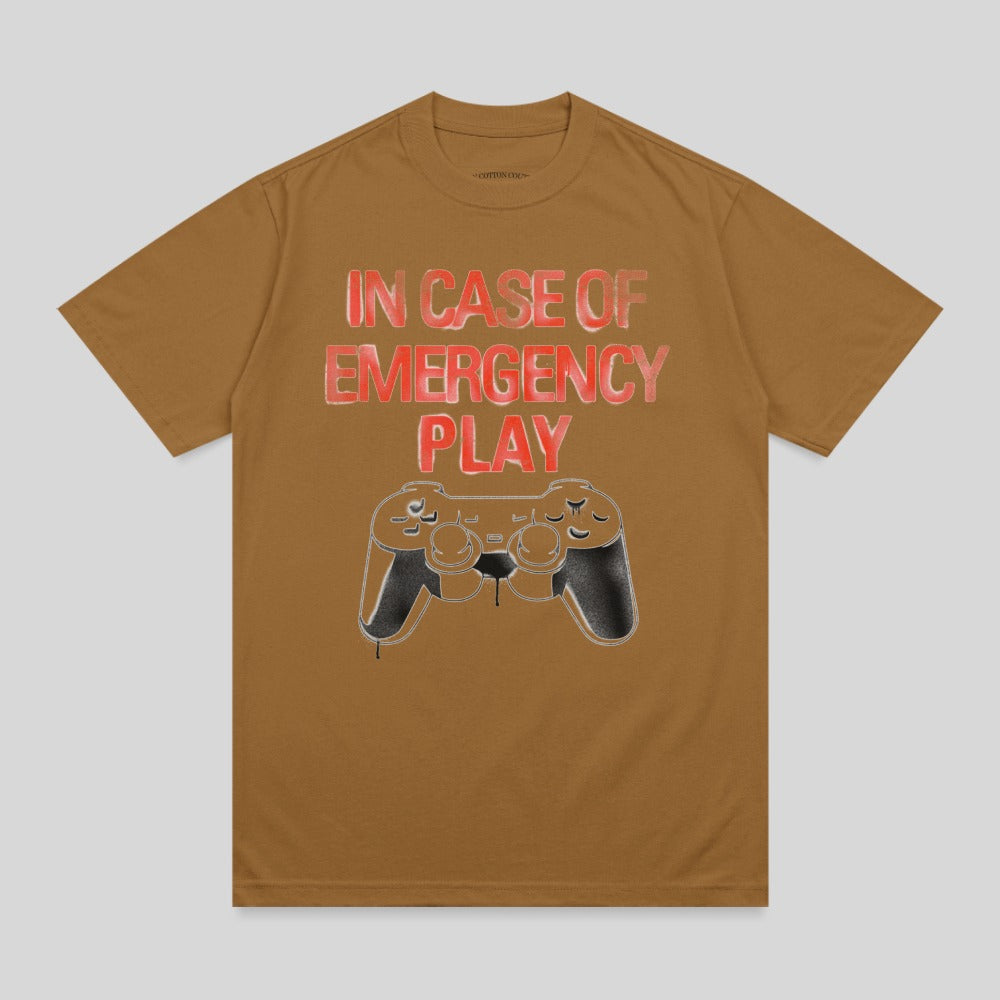Brown t-shirt with "IN CASE OF EMERGENCY PLAY" and a controller graphic.