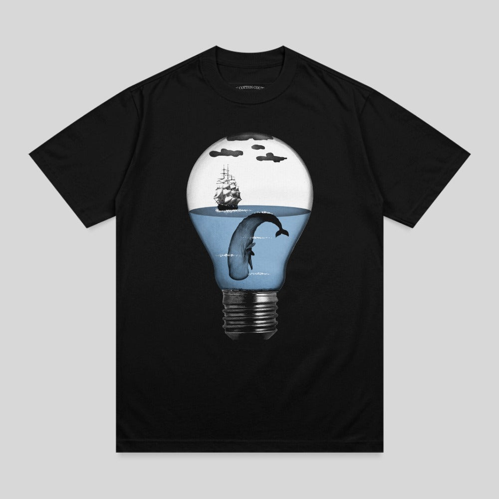 Black t-shirt with a lightbulb containing a whale and sailboat.