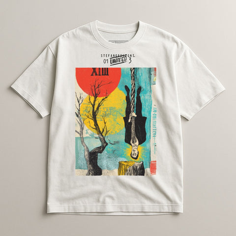 White t-shirt with hanging figure, red circle, and tree graphic.