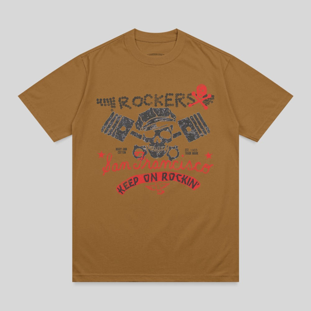 Brown t-shirt with "Rockers Keep On Rockin'" graphic featuring a skull.