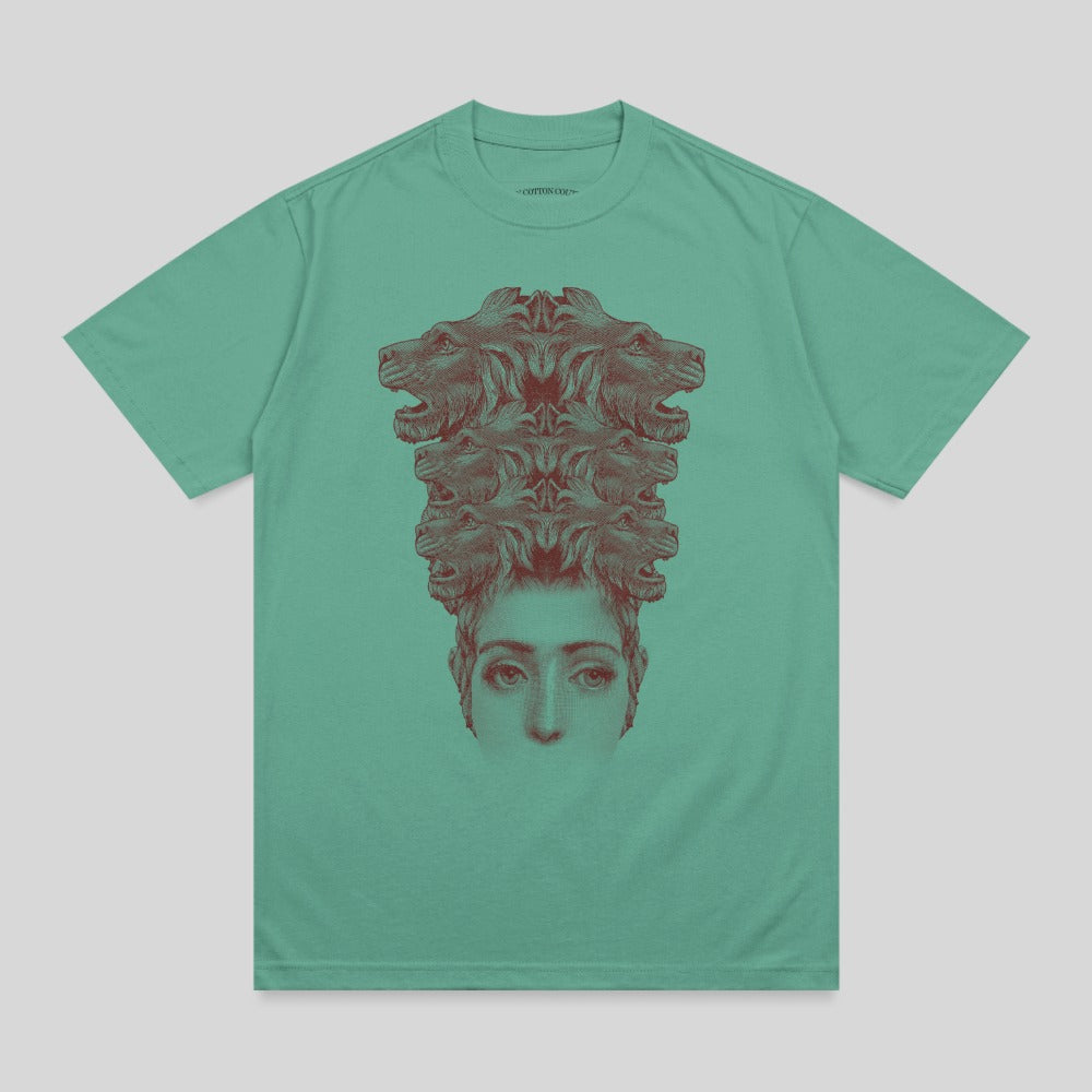 Teal t-shirt with a graphic of a woman's face crowned by multiple lion heads.