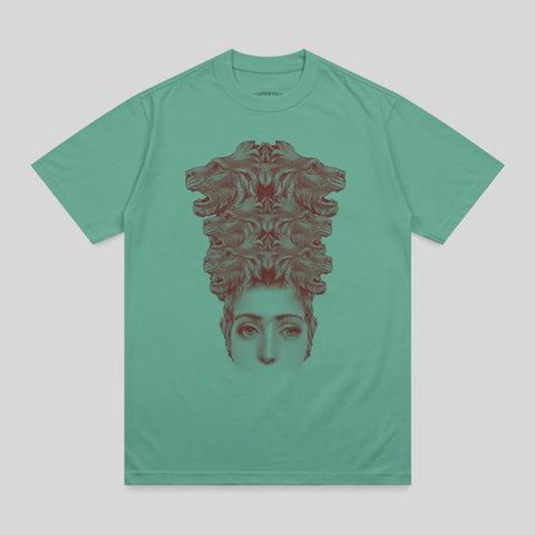 Teal t-shirt with a graphic of a woman's face crowned by multiple lion heads.